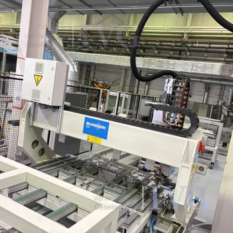 Glass conveyor with adhesive application machine BYSTRONIC TPA