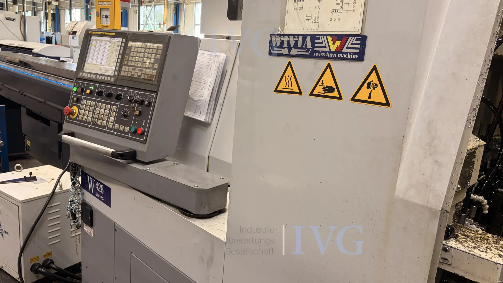 CNC-Langdrehmaschine mit Stangenlader WIVIA W428 – foto 2 – kavel bij IVG, Mahlstetten