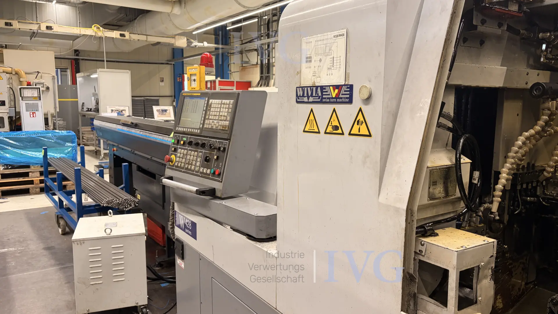 CNC-Langdrehmaschine mit Stangenlader WIVIA W428 – foto 2 – kavel bij IVG, Mahlstetten