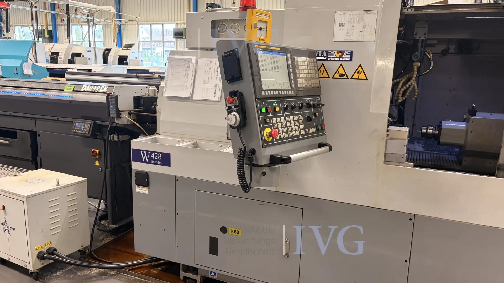 CNC-Langdrehmaschine mit Stangenlader WIVIA W428 – foto 2 – kavel bij IVG, Mahlstetten