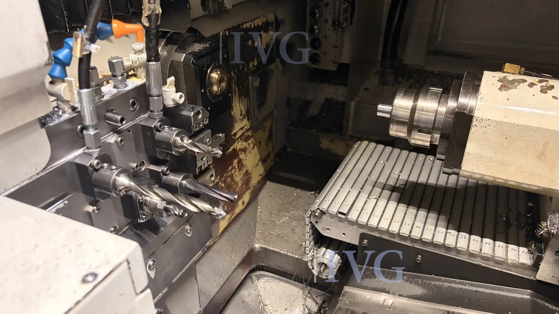 CNC-Langdrehmaschine mit Stangenlader WIVIA W428 – foto 5 – kavel bij IVG, Mahlstetten