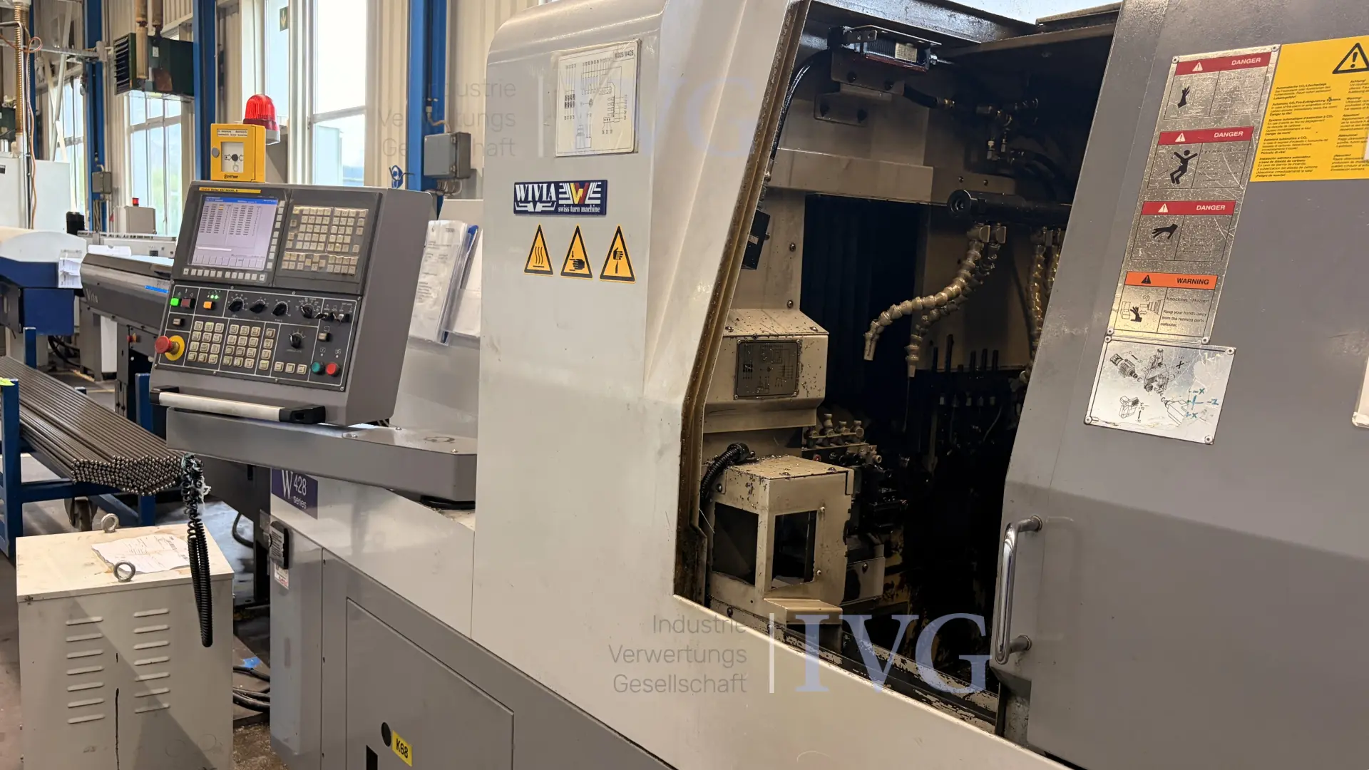 CNC-Langdrehmaschine mit Stangenlader WIVIA W428 – foto 2 – kavel bij IVG, Mahlstetten