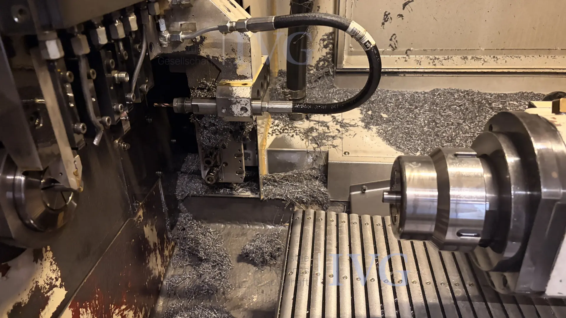 CNC-Langdrehmaschine mit Stangenlader WIVIA W428 – foto 6 – kavel bij IVG, Mahlstetten